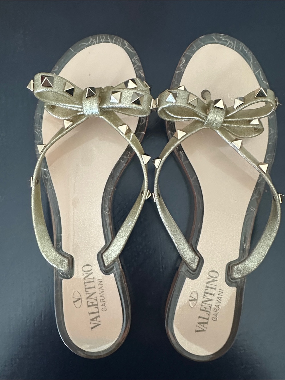 Valentino Garavani Metallic Gold Bow Studded Flat Sandals
